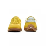 Championes Converse Run Star Trainer amarillos de gamuza con logo plateado y suela de goma marrón.