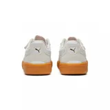 Championes Puma Palermo Lamoda, color blanco con detalles en rosa y suela de goma color caramelo.