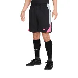 Short deportivo negro con detalles en gris y fucsia, con logo de Nike en la pierna derecha.