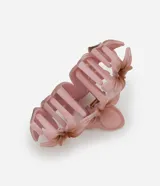 Pinza para el pelo color rosa con forma de tres flores de jasmim.
