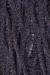 Cárdigan largo de tejido de punto calado color negro.