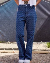 Jean de tiro bajo en color azul denim, con grabado láser del monograma RENÉE y diseño oversize.