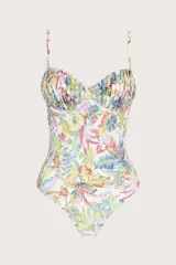 Traje de baño entero con estampado floral multicolor, de cobertura media, con copas preformadas, pliegues y varillas. Tiene breteles delgados ajustables y espalda baja con amarre de coletas.