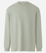 Remera verde de hombre Blue Steel, modelo relaxed, de manga larga y cuello redondo, confeccionada en algodón más sostenible con tela texturizada a rayas.