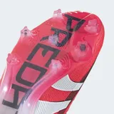 Championes de fútbol Adidas Predator Elite color rojo con detalles en blanco y suela transparente con tapones.