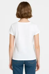 Remera negra de algodón con estampado de un moño blanco con estrellas.