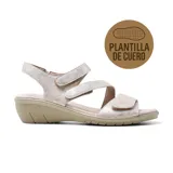 Sandalias plateadas con plantilla de cuero, tres tiras con ajuste de velcro y suela de goma.