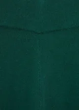 Pantalón largo de punto fino color verde oscuro, con diseño wideleg y cintura elástica.