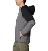 Campera tipo softshell con capucha, de color gris y negro. Presenta un diseño bicolor con el cuerpo principal gris y los hombros/mangas superiores en negro. Cuenta con cierre frontal de cremallera, bolsillos laterales con cremallera y puños elásticos.