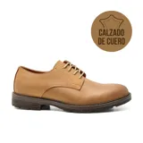 Zapato casual de cuero color marrón con cordones y suela de goma.