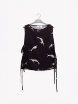 Musculosa de viscosa y poliamida con estampado de flores, con lazos en los costados.