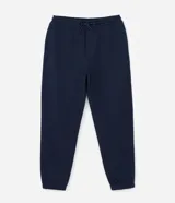 Pantalón jogger azul marino, de corte holgado con puños ajustados en los tobillos y cintura elástica con cordón.