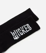 Medias de caña alta negras con estampa de letras blancas con la palabra "WICKED".