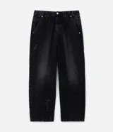 Pantalón masculino super baggy confeccionado en jeans sostenible con cintura con trabilla, cierre tradicional, bolsillo cuchillo, frisos y efecto de respingos.