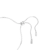 Pulsera tenis con Swarovski Zirconias transparentes y una zirconia verde central, bañada en rodio.