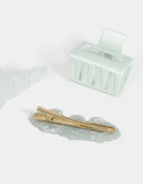 Set de accesorios para el pelo que incluye dos broches, uno de 9 cm y otro de 5,5 cm, y una hebilla francesa con forma de caracolas de mar.