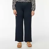 Pantalón ancho azul marino de punto gofrado con textura.