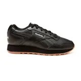 Championes Reebok Glide color negro, de estilo casual y deportivo. Confeccionados en cuero sintético con detalles de costuras y logo de la marca en el lateral. Suela de goma color caramelo.