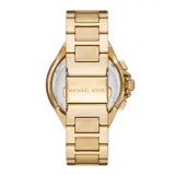 Reloj Michael Kors modelo Camille, con caja y pulsera de acero inoxidable color dorado, esfera blanca con números romanos y tres subesferas.