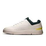 Championes urbanos The Roger Advantage 2, color blanco con detalles en verde y amarillo.