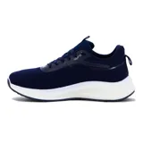 Championes de running para hombre, modelo Barcelona, color azul marino con detalles en blanco. Presentan una capellada de malla transpirable, cordones azules y un logo lateral estilizado en blanco. La suela es gruesa y blanca, con una sección de goma oscura en la parte delantera.