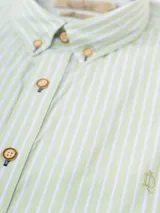 Camisa de hombre marca La Dolfina, de manga larga, con cuello abotonado y estampado a cuadros pequeños en tonos azul y blanco. Presenta logo bordado en el pecho. Confeccionada en lino y poliéster.