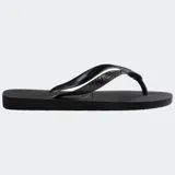 Ojotas Havaianas Top color blanco, con suela de goma y tiras con diseño de espiga.