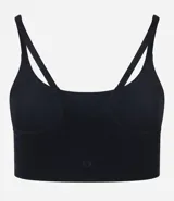 Conjunto deportivo color verde agua compuesto por un top con breteles finos y un short de ciclista.