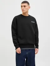 Buzo negro de algodón con cuello redondo, manga larga y puños acanalados. Estampa en la espalda con la frase "Find your paradise" y un diseño de dos peces koi.