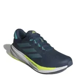 Championes de running Adidas Supernova Stride 2, color azul petróleo con detalles en verde menta y amarillo.