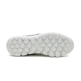 Zapatillas Caterpillar Hex Lite Leather color azul marino con detalles en violeta y suela blanca. Capellada de cuero flor, forro interno de materiales reciclados, plantilla de espuma PU, suela de EVA liviana.