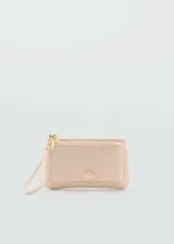 Monedero grande color beige, de tejido de nylon, con doble compartimento y cierre de cremallera doble.