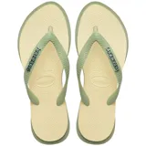 Ojotas Havaianas Top Point Fusion, color verde claro con base color crema.
