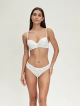 Pack de dos colaless de algodón con estampado floral en tonos celeste y naranja, con detalle de puntilla blanca en los bordes.