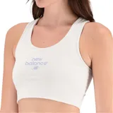 Top deportivo blanco con logo de New Balance en celeste.