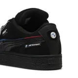 Championes Puma BMW Motorsport Suede XL, color negro, con detalles en azul y rojo, logo de BMW Motorsport en el lateral y suela texturizada.