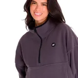 Buzo polar Caterpillar para mujer, color gris topo, con cierre a mitad del pecho y logo de la marca en el pecho izquierdo.