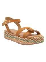Sandalias con plataforma de rafia multicolor y tiras de cuero color suela.