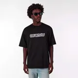 Camiseta negra de corte oversize con el logo de Off-White estampado en el pecho en blanco con contorno negro.