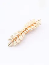 Broche dorado para el pelo con forma de hoja.